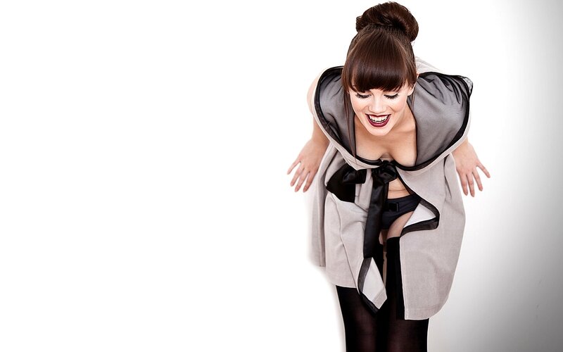 Woman in Gray Coat — Playful