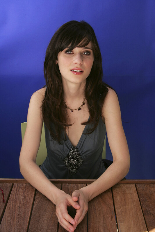 woman in gray dress at table