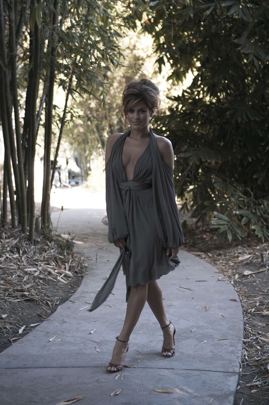 Woman in gray dress on path