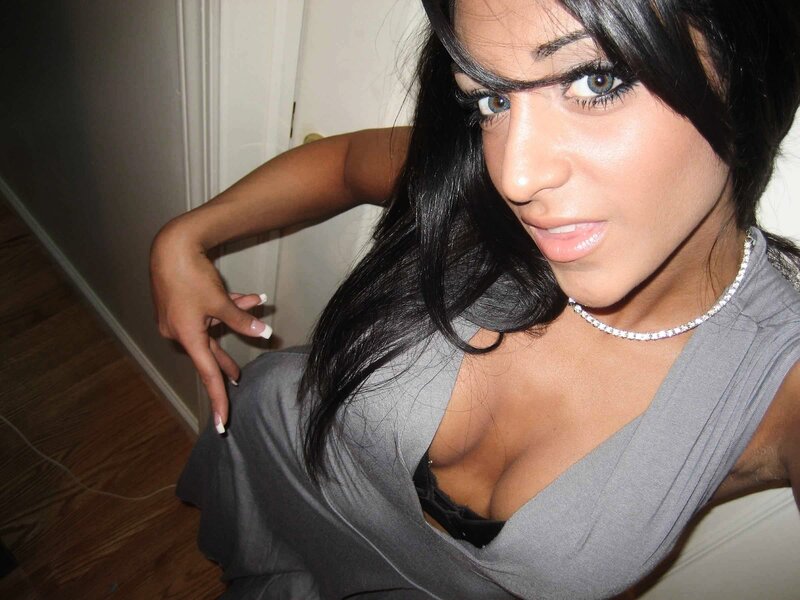 woman in gray dress posing