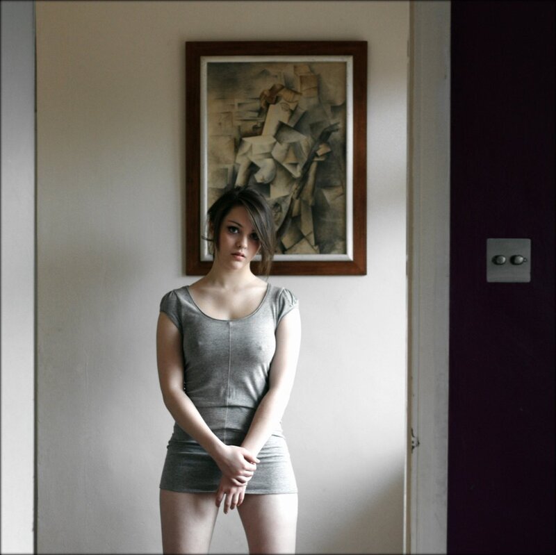 woman in gray dress standing