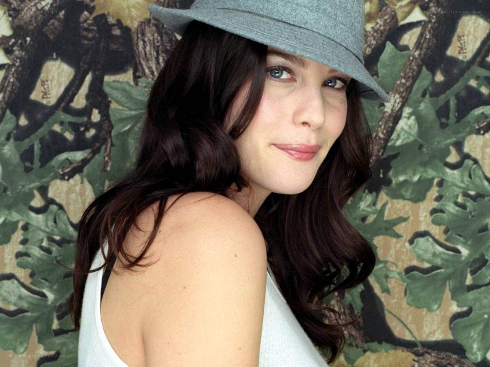 woman in gray hat smiling