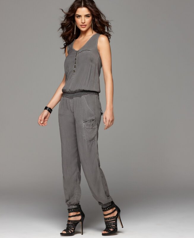 Woman in gray jumpsuit