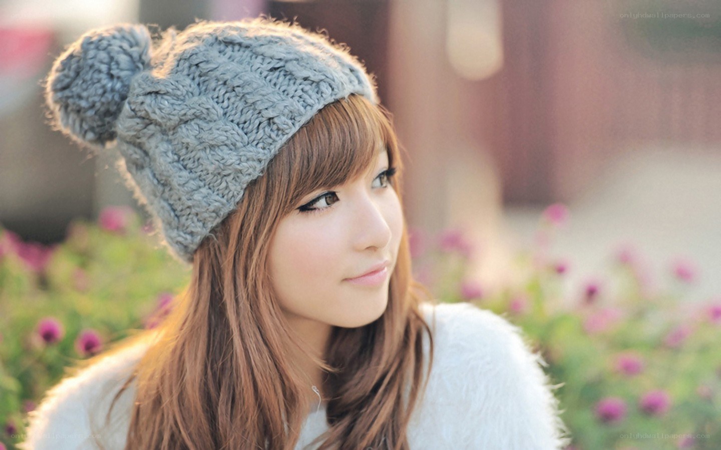 woman in gray knit hat