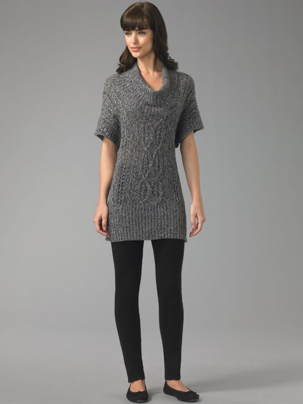 Woman in gray knit tunic