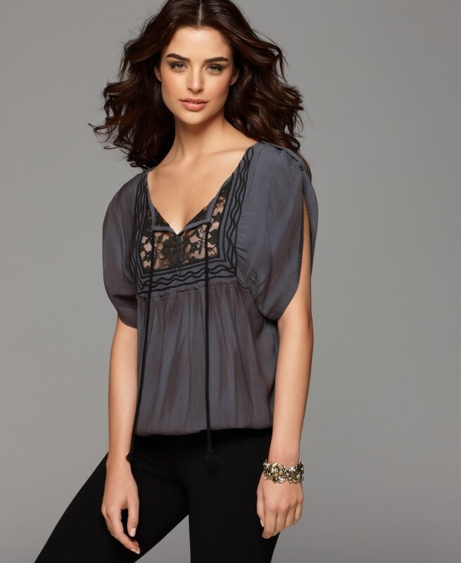 woman in gray lace top