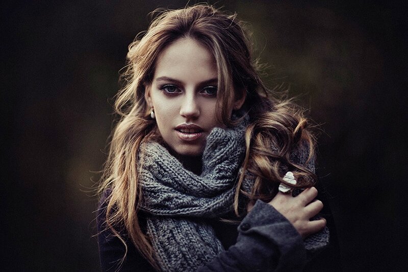 woman in gray scarf
