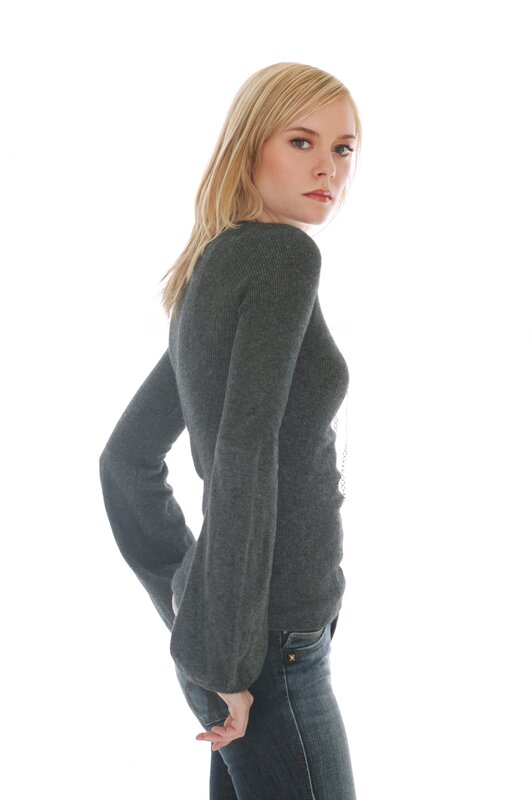 woman in gray sweater