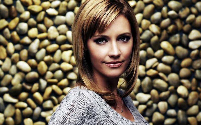 woman in gray sweater