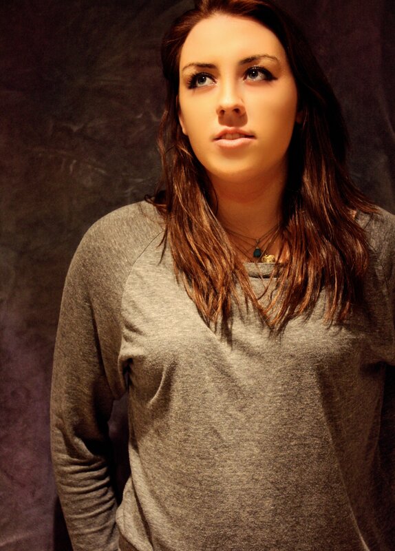 woman in gray sweater