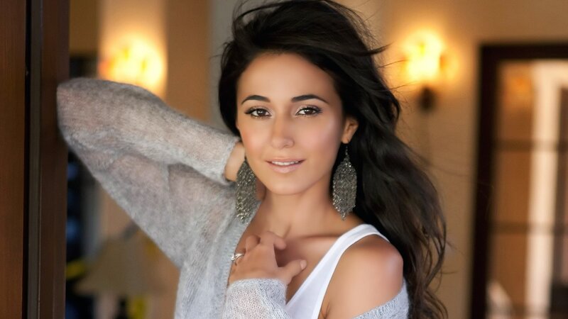 woman in gray sweater