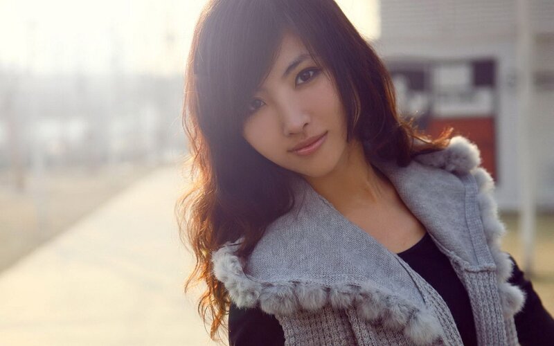 woman in gray sweater