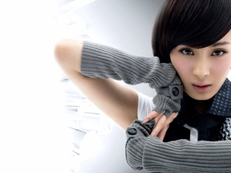 woman in gray sweater