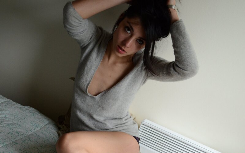 woman in gray sweater