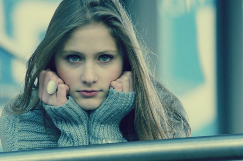 woman in gray sweater