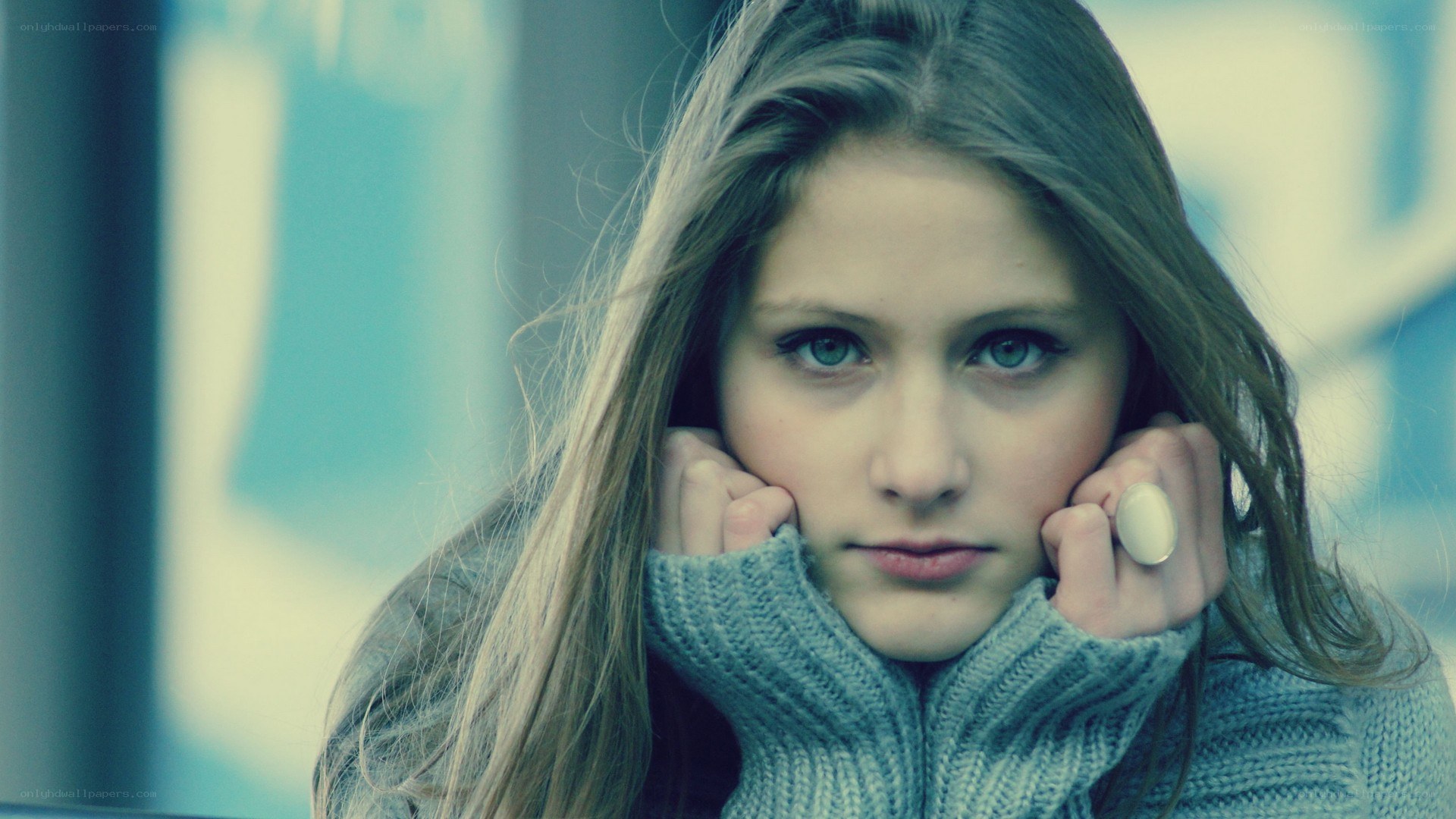 woman in gray sweater