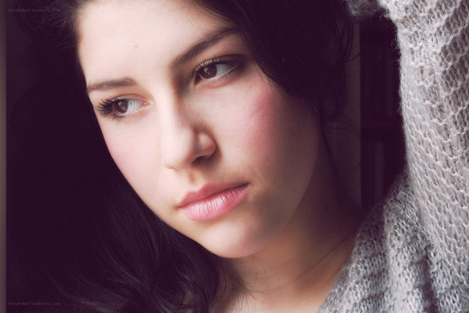 woman in gray sweater