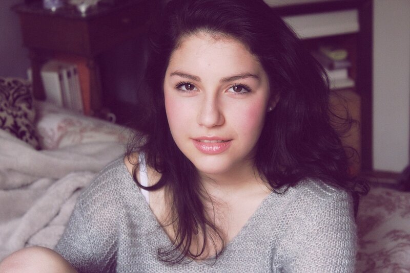 woman in gray sweater