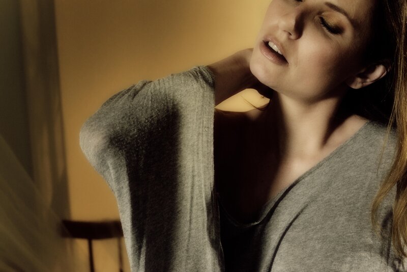 woman in gray sweater