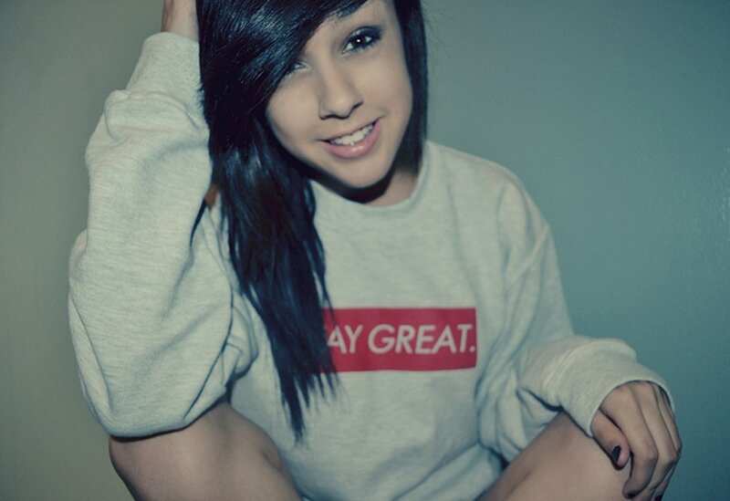 woman in gray sweatshirt