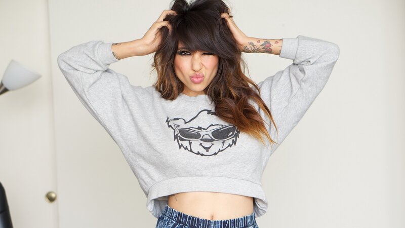 woman in gray sweatshirt