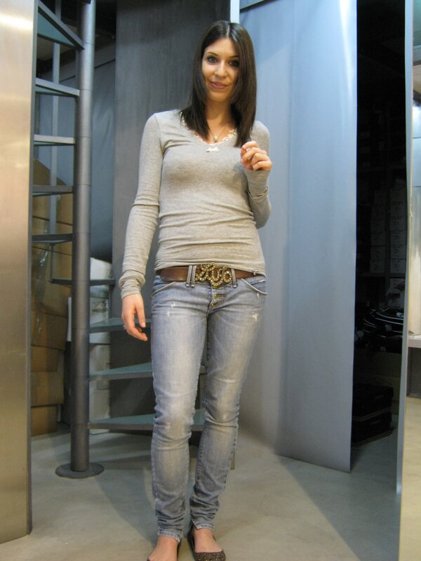 woman in gray top and jeans