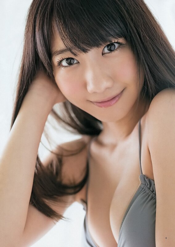 woman in gray top smiling
