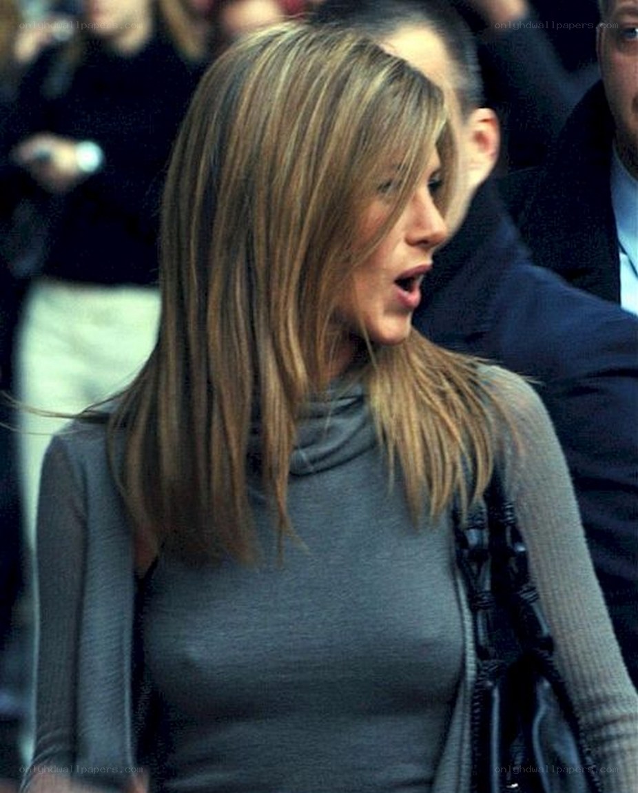 woman in gray top walking
