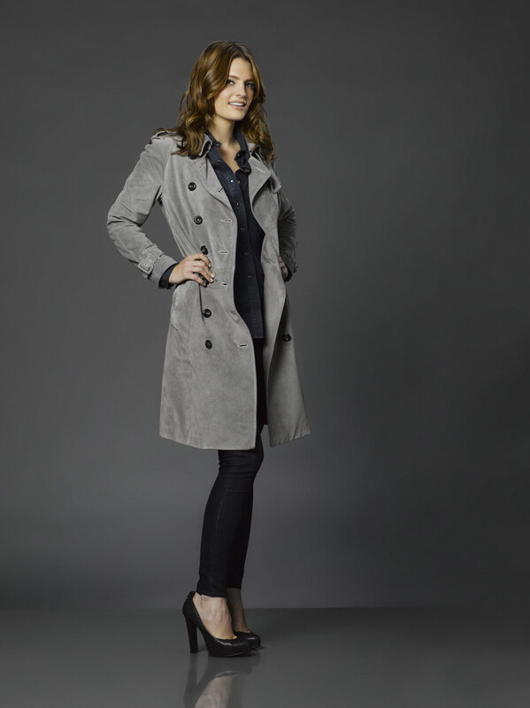 woman in gray trench coat
