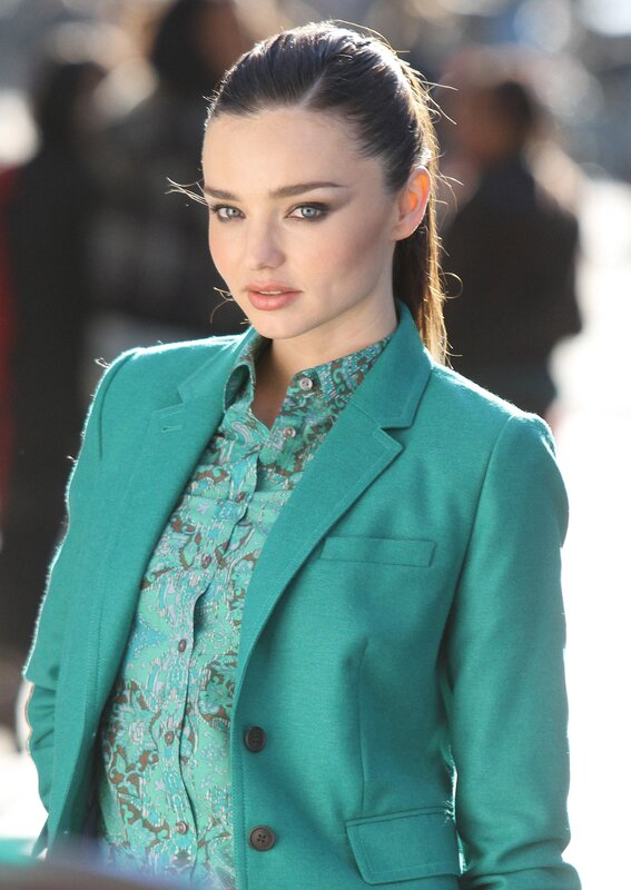 woman in green blazer