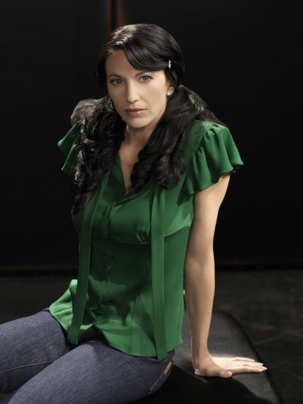 woman in green blouse