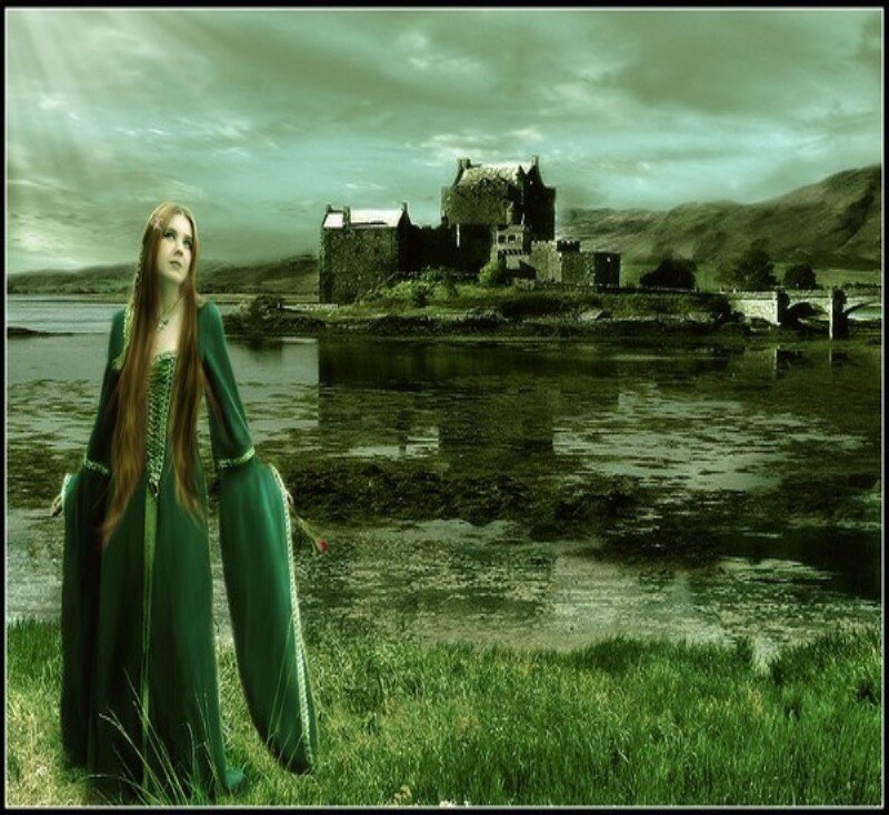 woman in green by a castle