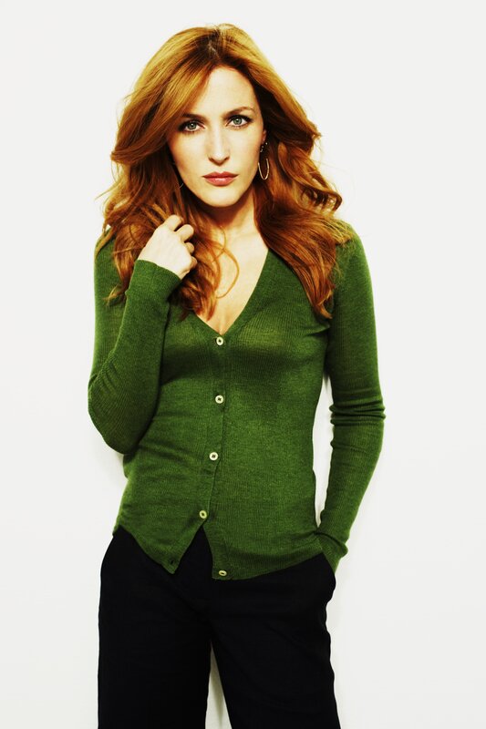 woman in green cardigan