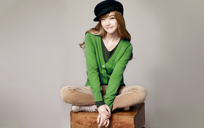 woman in green cardigan