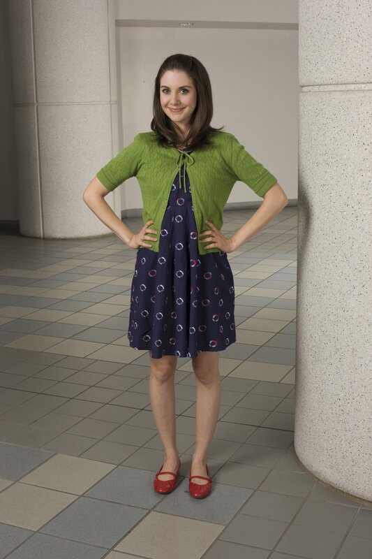 Woman in Green Cardigan — Confident, Photograph