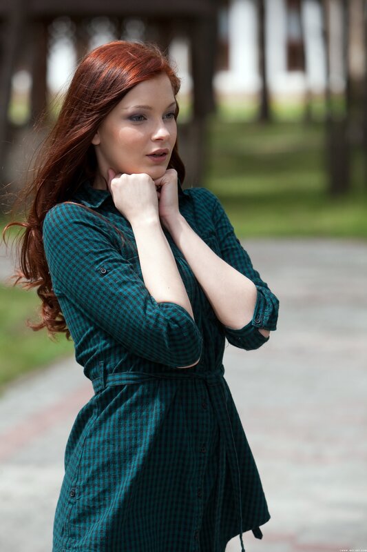 woman in green checkered dress