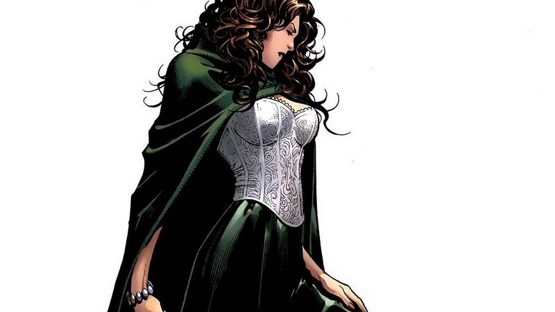 woman in green cloak