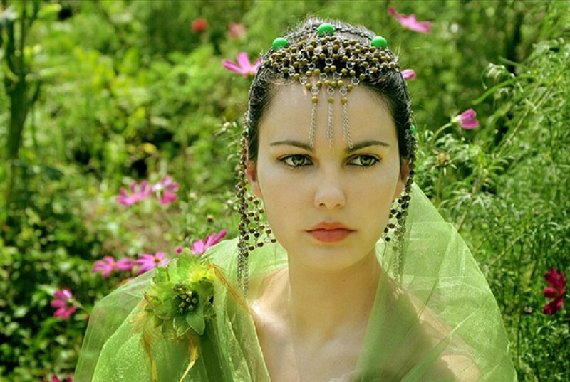 Woman in Green Costume — Serene
