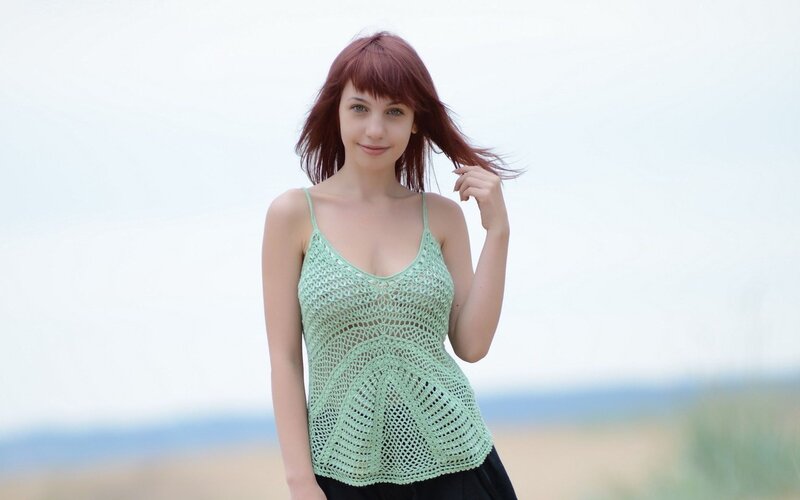 woman in green crochet top