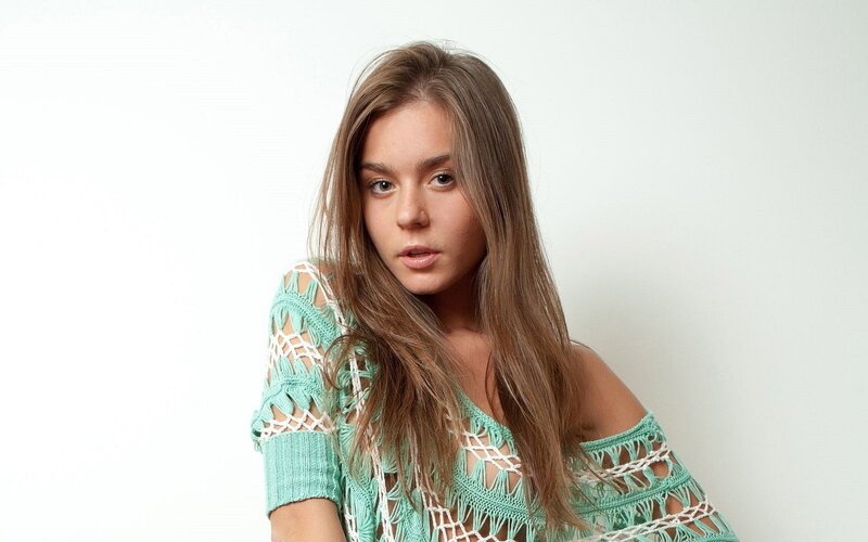 woman in green crocheted top