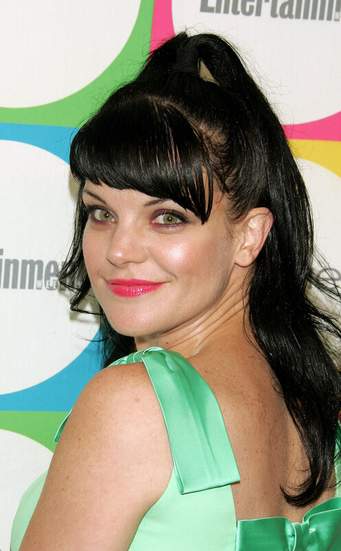 woman in green dress at event