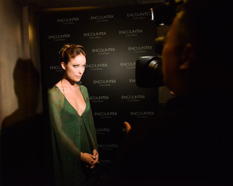 woman in green dress at event