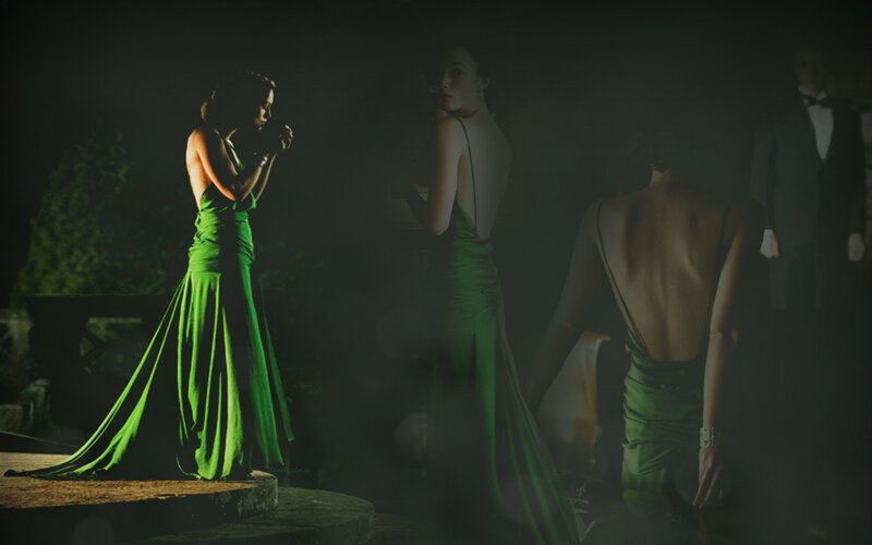 woman in green dress at night