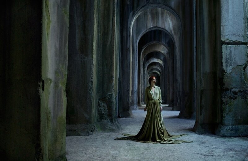 Woman in Green Dress — Dramatic, Photograph, Stone Arches