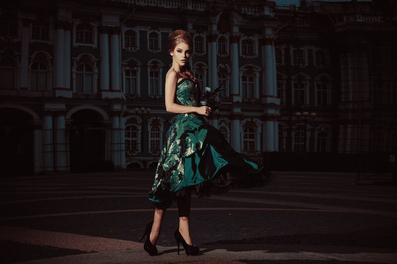 Woman in Green Dress — Dramatic, Sunset, Photograph, Building