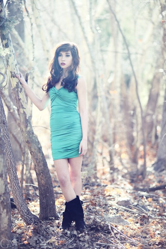 woman in green dress in forest