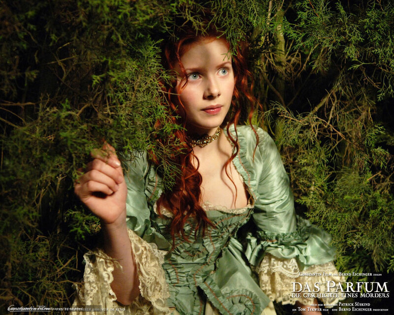woman in green dress in forest