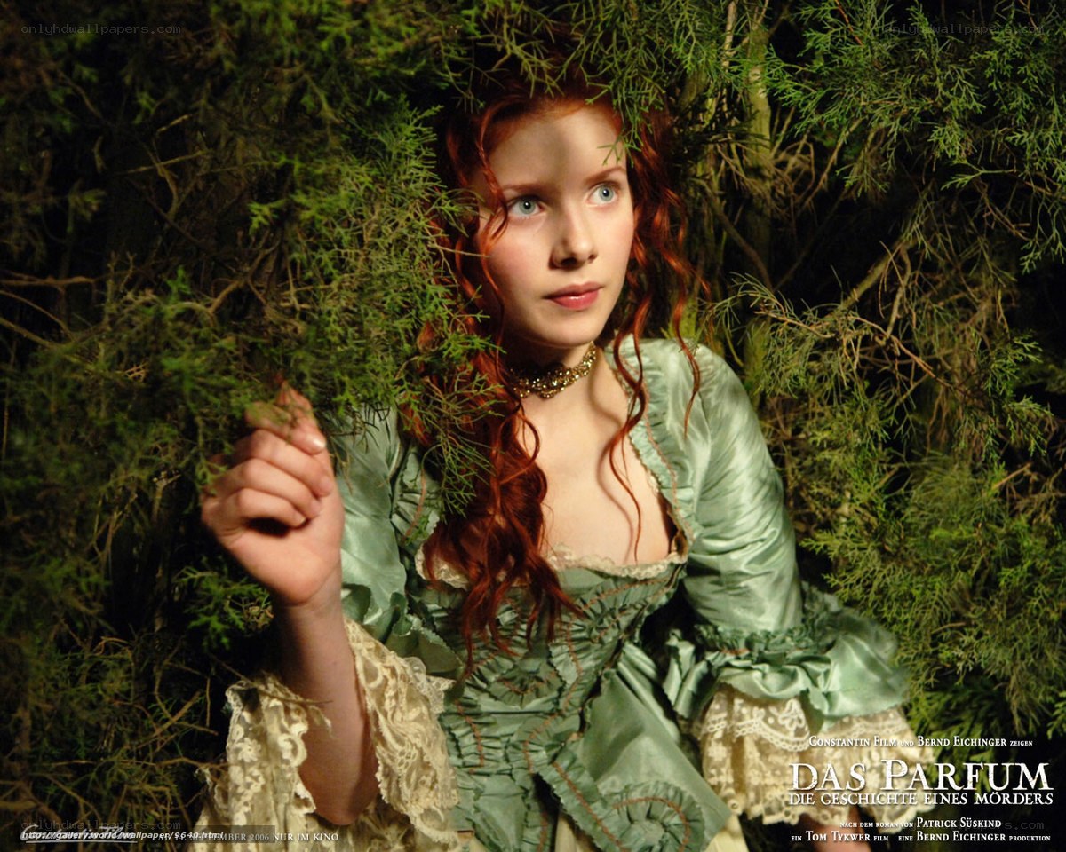 woman in green dress in forest