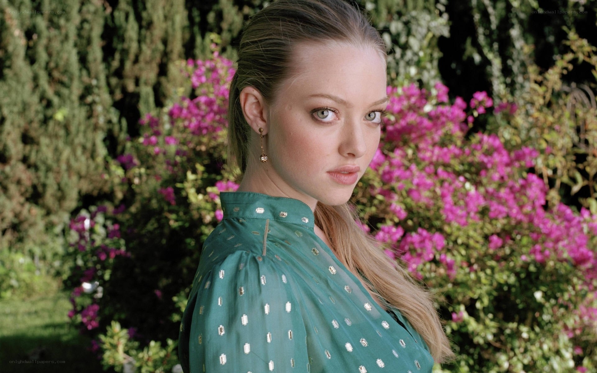 woman in green dress outdoors