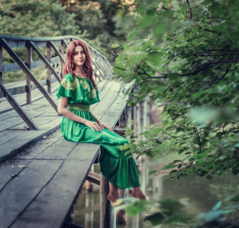 Woman in Green Dress — Serene, Afternoon, Photograph, Bridge